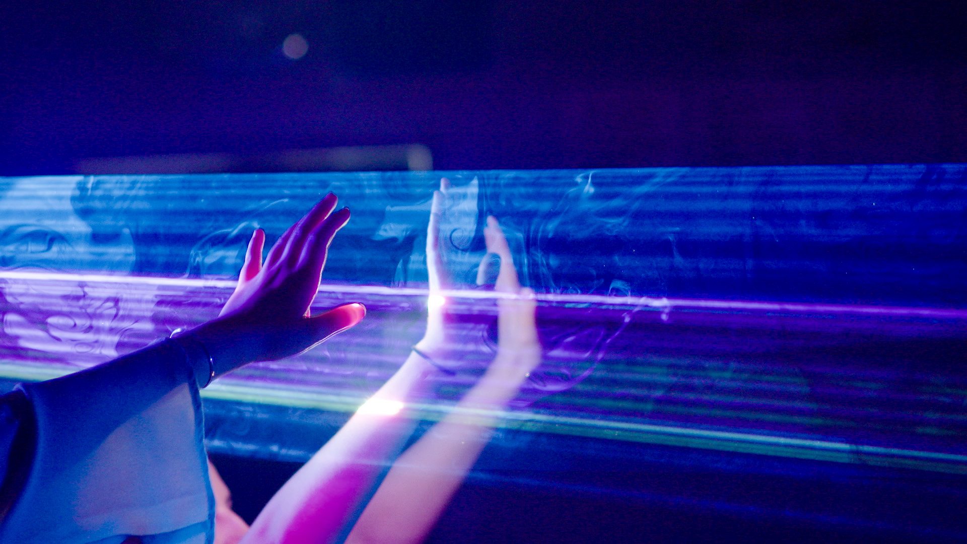 A clip from Everybody in the Place: an Incomplete History of Britain 1984-1992 with teenagers waving their hands about in lasers